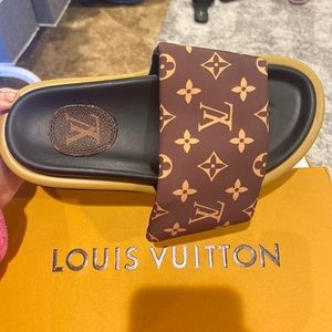 Louis Vuitton slides size 37 from the gate